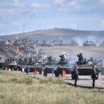 Хитой россиялик ҳарбийларни яширинча ўқитган
